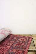 Tapis vintage rouge pâle